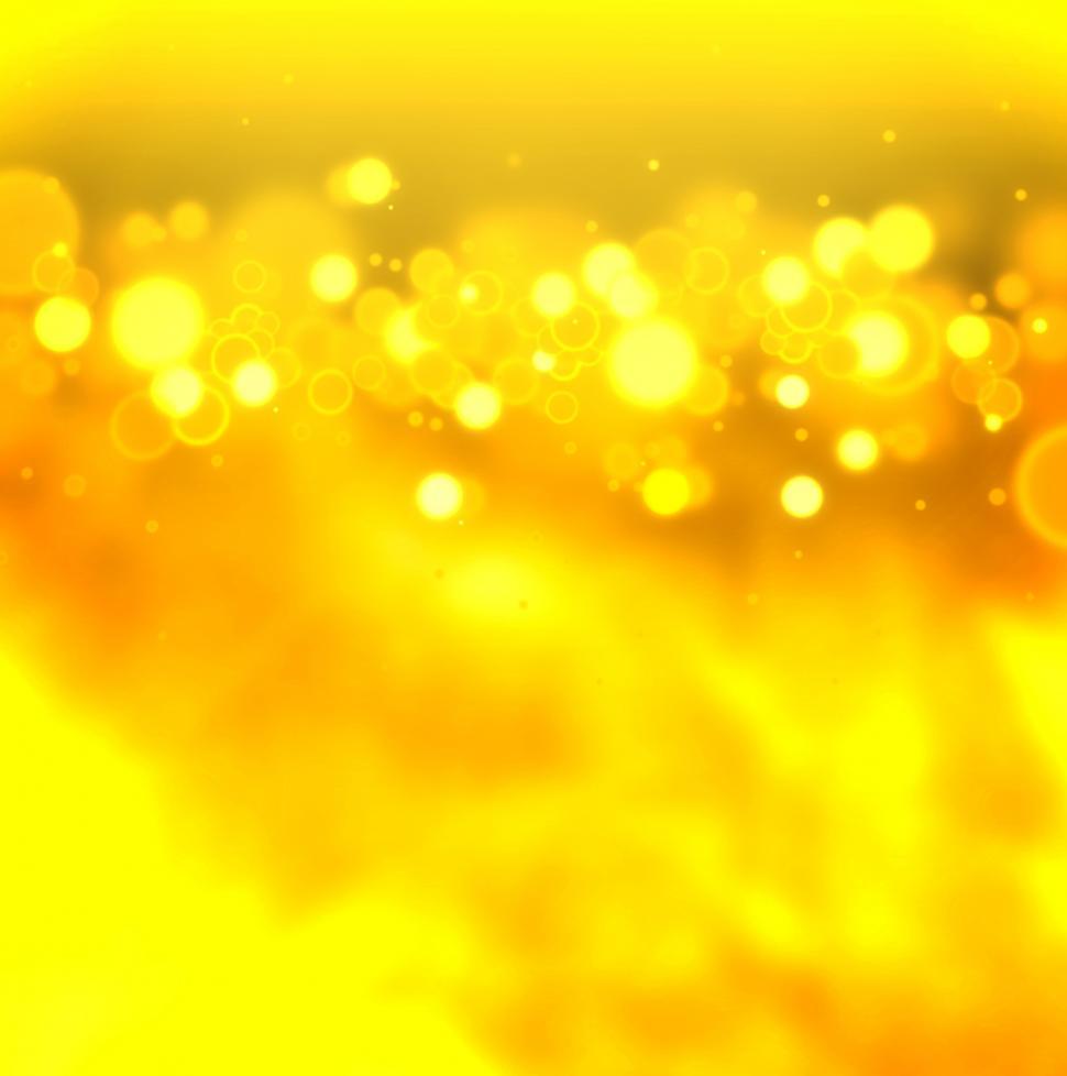 Free Image of Golden bokeh on gold background 