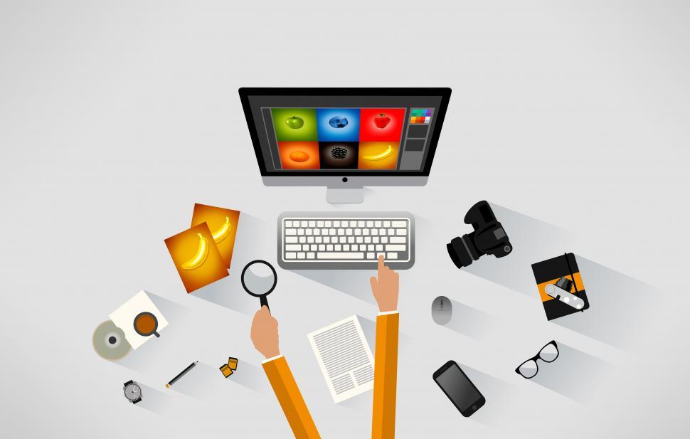 Free Image of Photographer working at the desk 