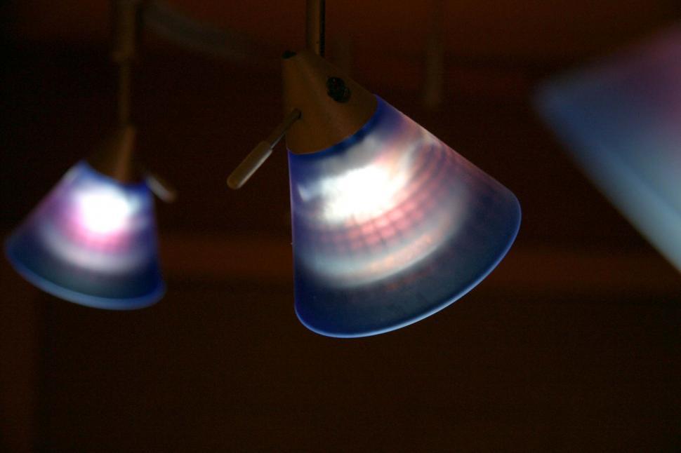 Free Image of Three Lights Hanging From Ceiling in Room 