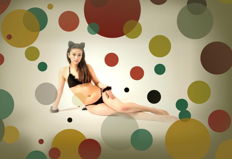 Free Image of Sexy asian woman wearing a costume - 70s style 
