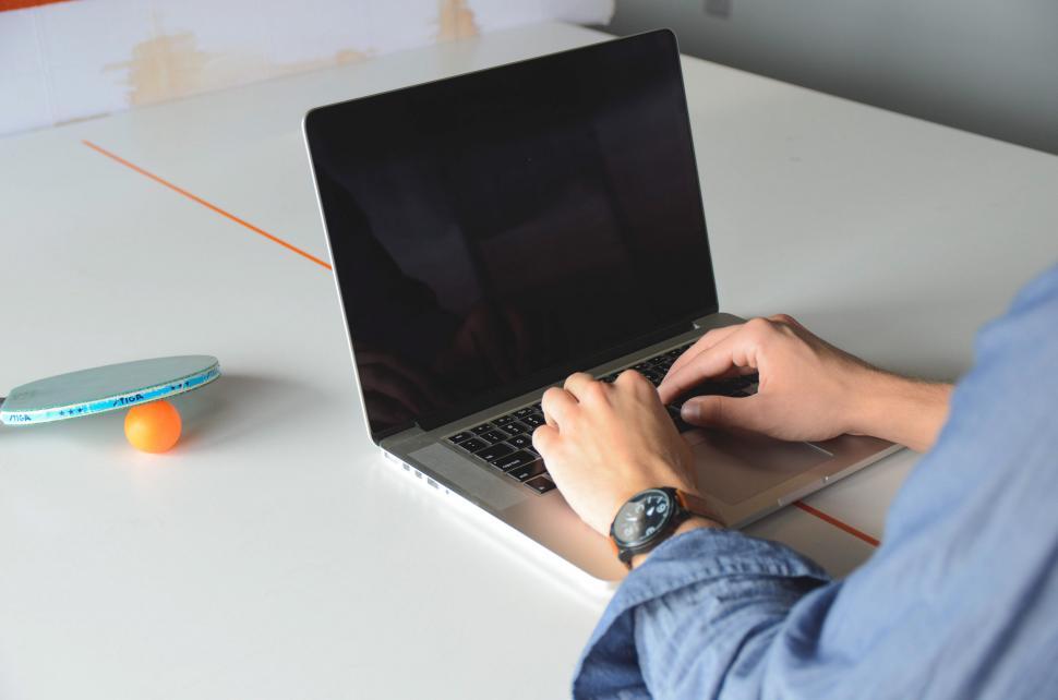 Free Image of Typing and ping pong 