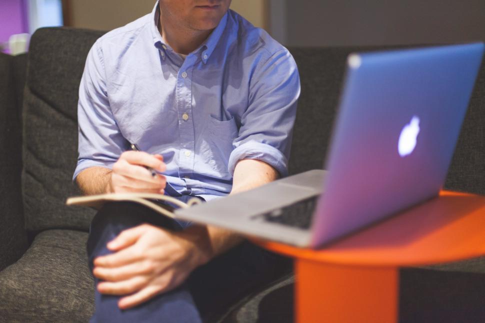 Free Image of Anonymous man working 