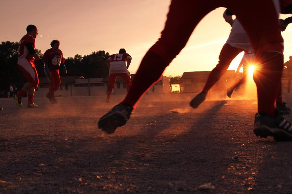 Free Image of Rugby players at sunset 