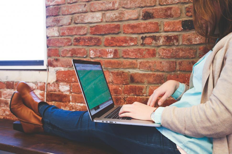 Free Image of Feet up, working 