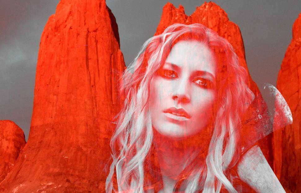 Free Image of Beautiful woman with an axe - Double exposure with Torres del Pa 