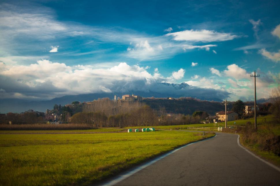 Free Image of A winding road through the fields 