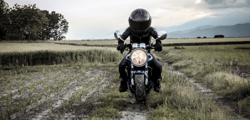 Free Image of Motorcyclist in the fieled 