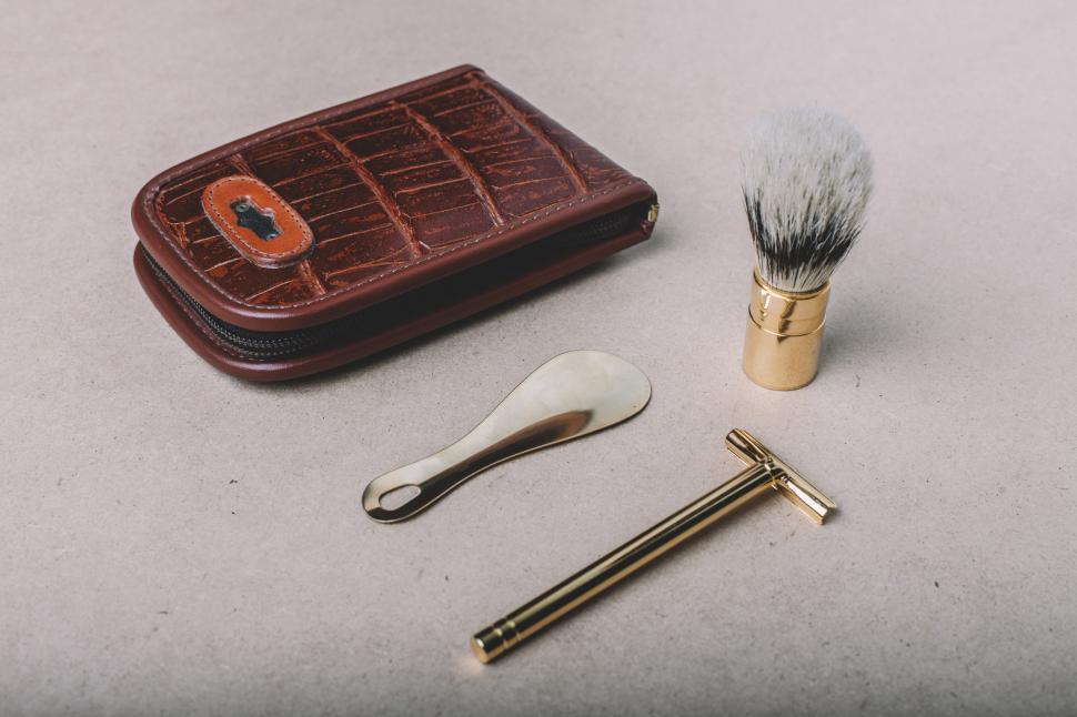 Free Image of Shaving Brush, Razor, and Razor Blade on Table 