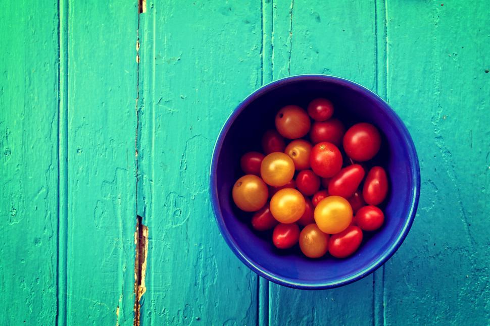 Free Image of Fresh colorful cherry tomatoes on wood background - Organic farm 