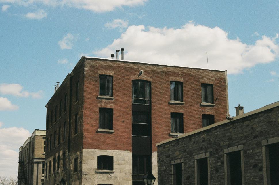 Free Image of Historic Brick Building With Clock Tower 