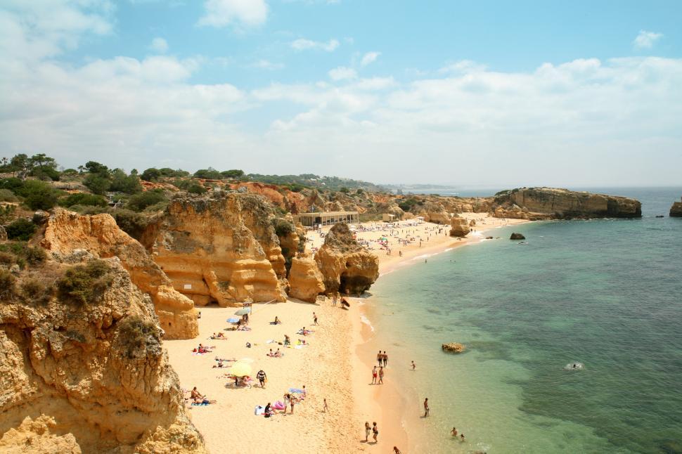 Free Image of People Enjoying Beach Activities on a Sunny Day 