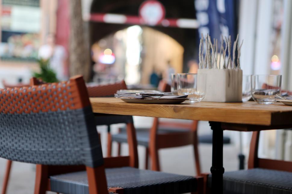 Free Image of Table With Two Chairs and Cake 