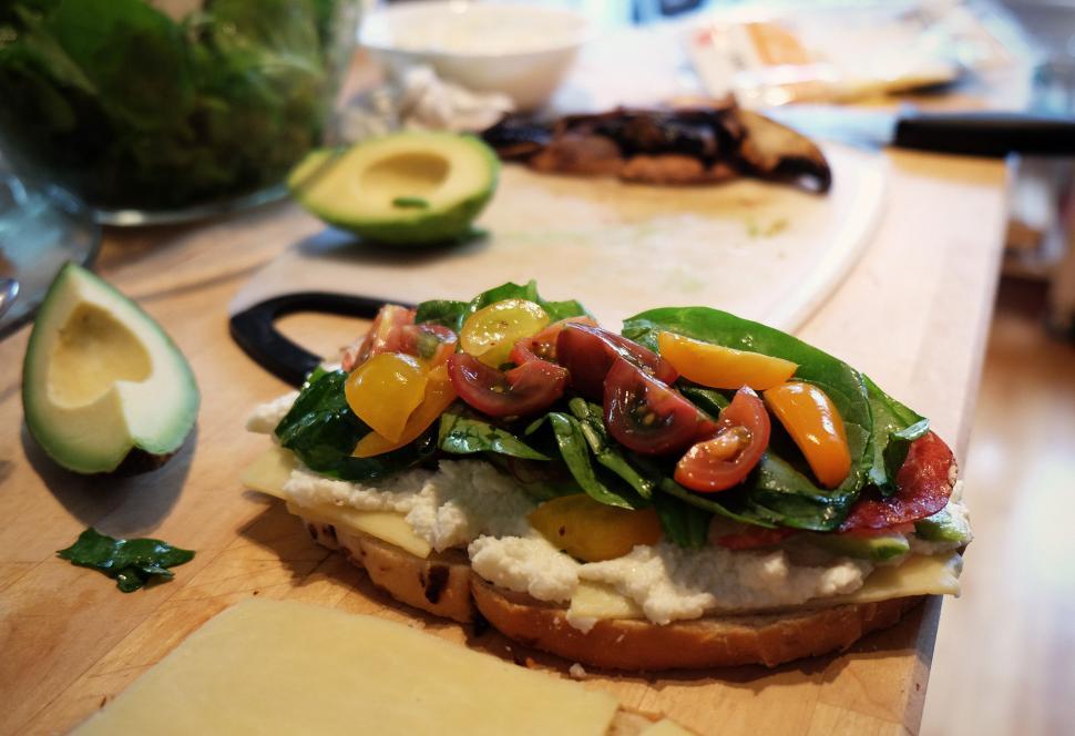 Free Image of Close Up of a Sandwich on a Cutting Board 