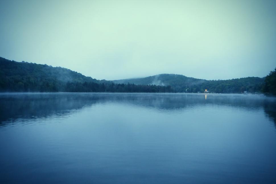 Free Image of Majestic Water Body Surrounded by Mountains 