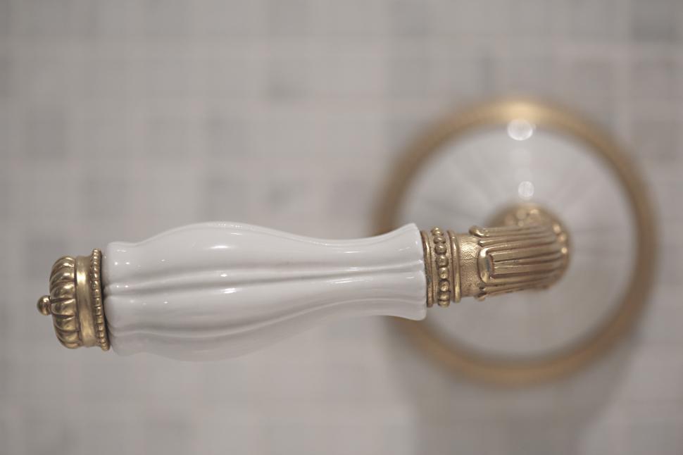 Free Image of Close Up of Toothbrush Holder on Wall 
