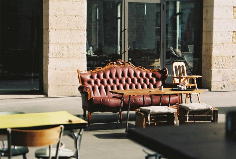 Free Image of Leather Couch Placed on Sidewalk 