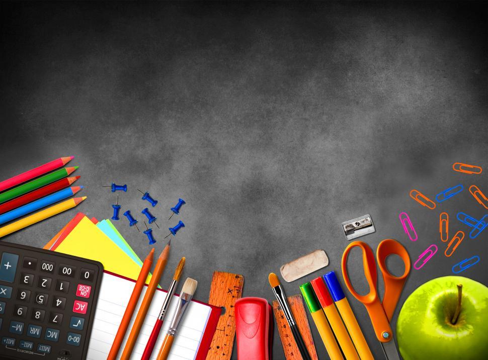 Free Image of Illustration of school supplies and material on blackboard backg 