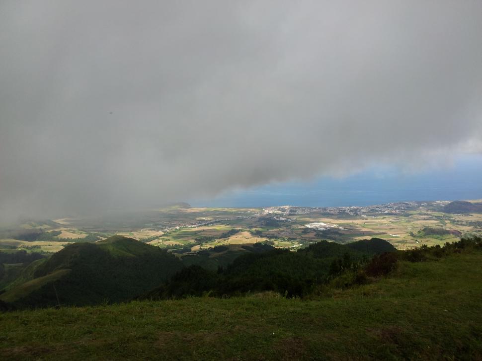 Free Image of Green mountains, fog bank and trees  