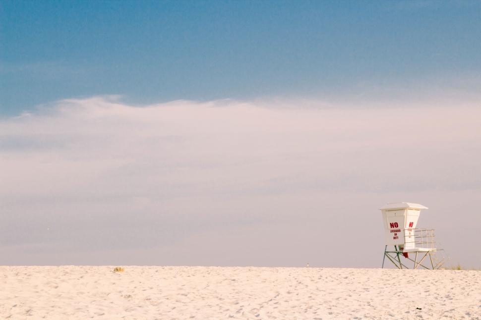 Free Image of Lifeguard Tower on Beach With Lifeguard 
