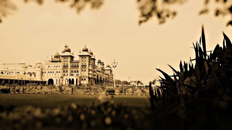 Free Image of Old Photo of a Large Building in the Middle of a Field 