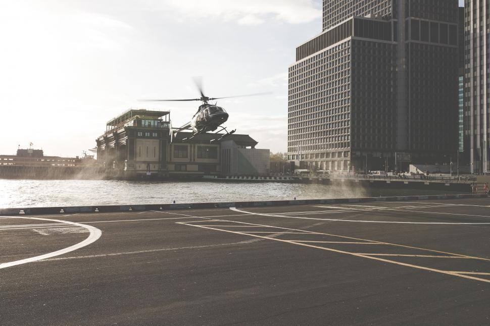 Free Image of Helicopter Flying Over City 