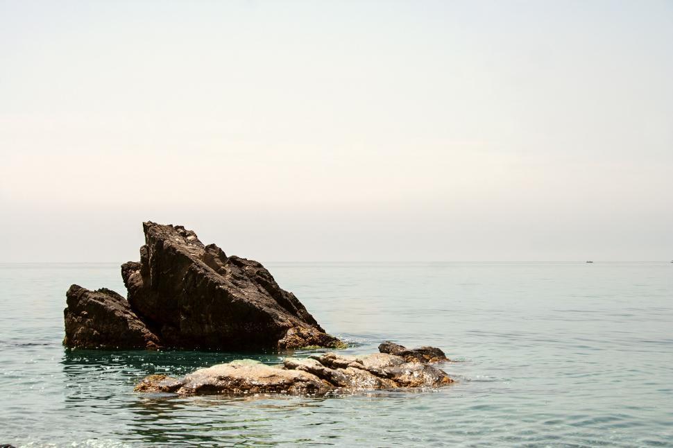 Free Image of Massive Rock Formation in the Middle of the Ocean 