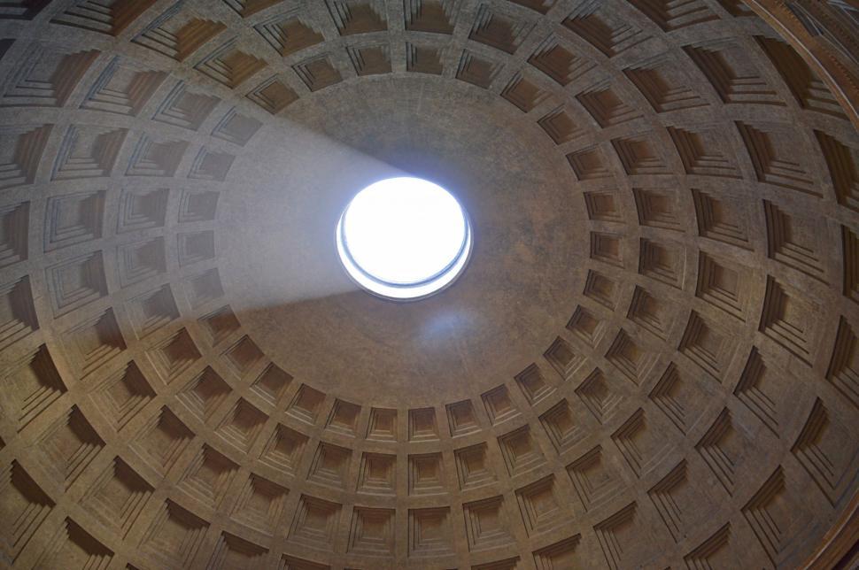 Free Image of Light Shines Through the Center of a Dome 