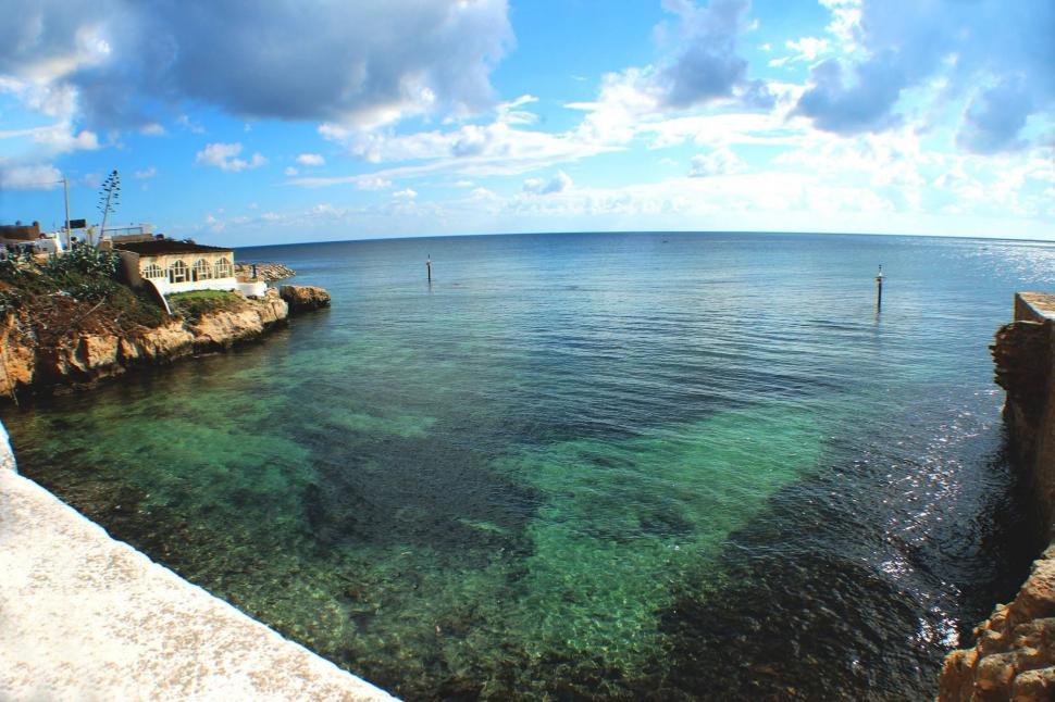 Free Image of Water Body Next to Cliff 