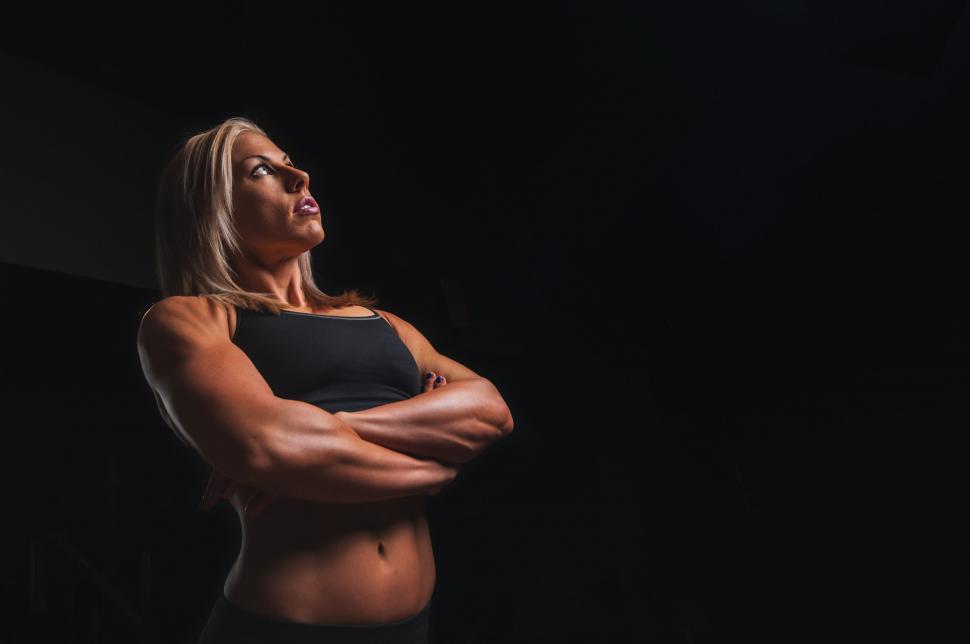Free Image of Woman With Arms Crossed Posing for a Picture 