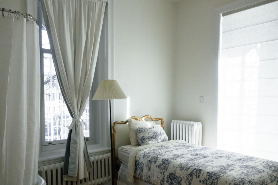 Free Image of Bedroom With Bed and Window 