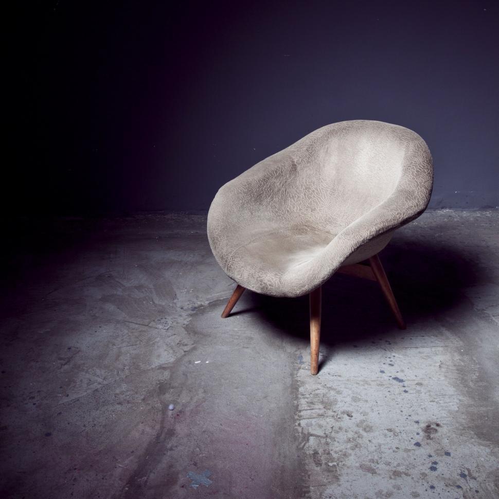 Free Image of White Chair on Cement Floor 
