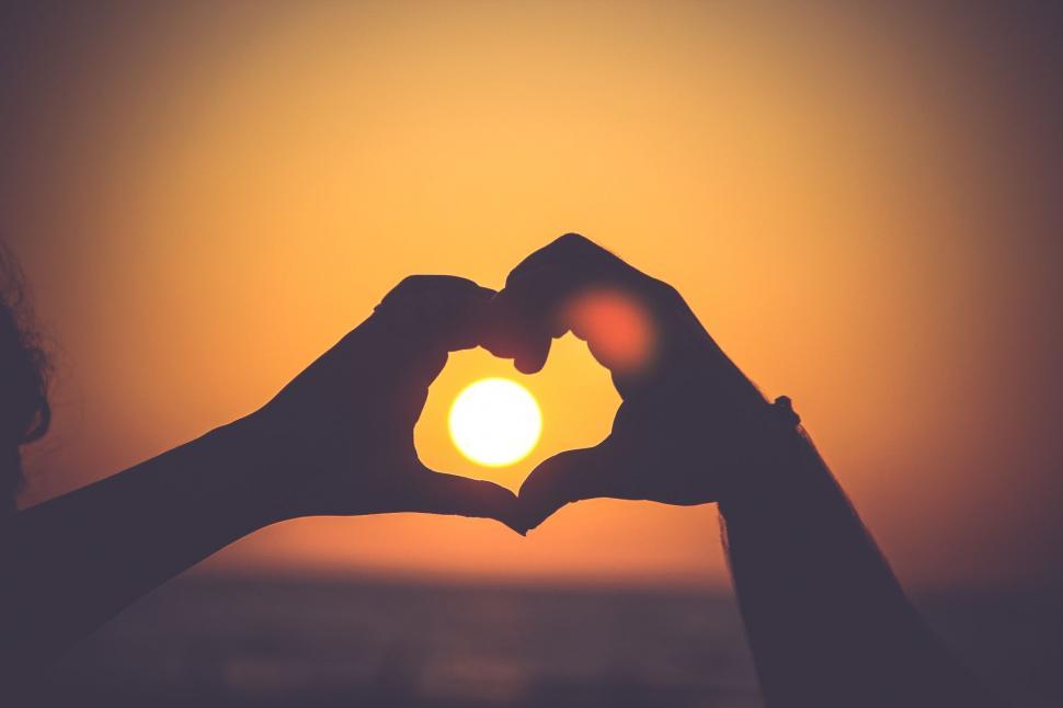 Free Image of Person Making Heart Shape With Hands 