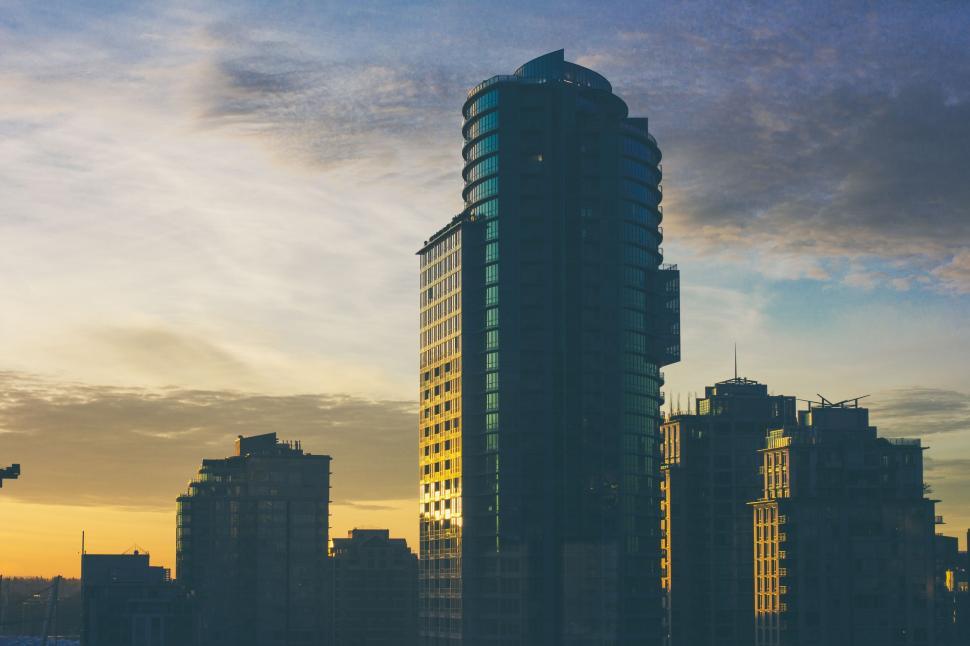 Free Image of City Skyline With Tall Buildings at Sunset 