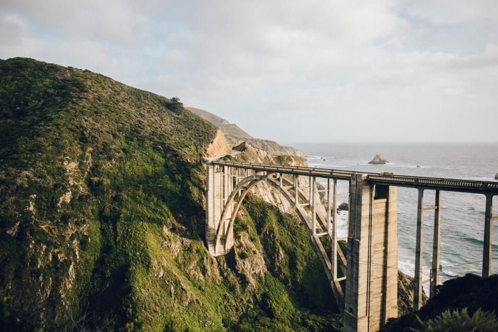 Free Image of Large Bridge Spanning a Wide Waterway 