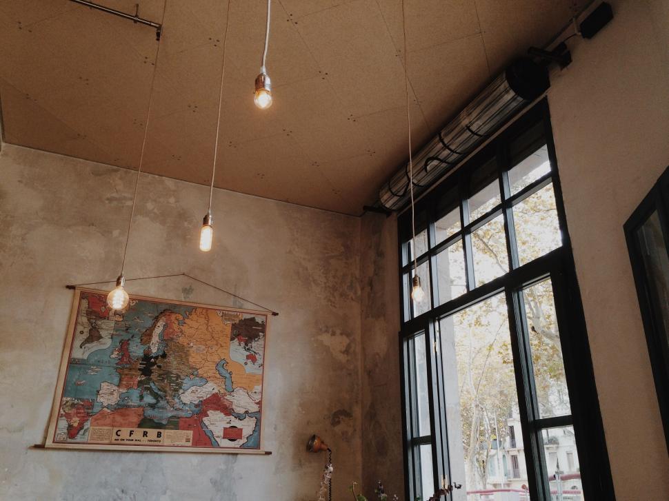 Free Image of Room With Large Window and Painting 