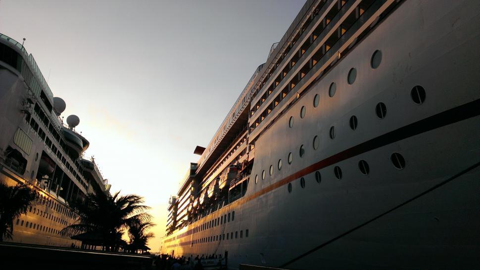 Free Image of Two Cruise Ships Docked Side by Side 