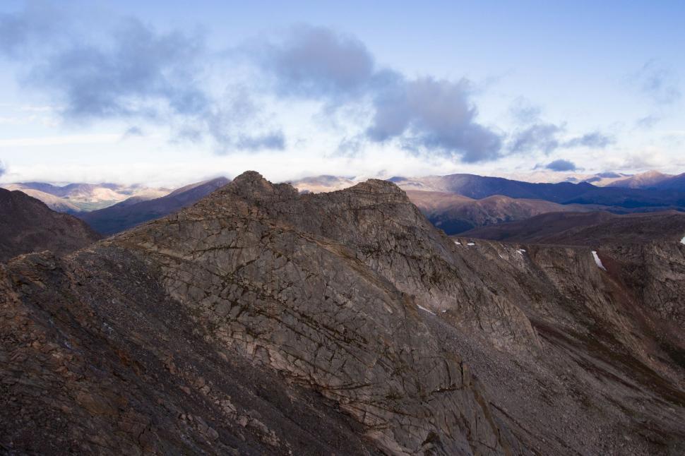 Free Image of Snow Capped Mountain Range in the Distance 