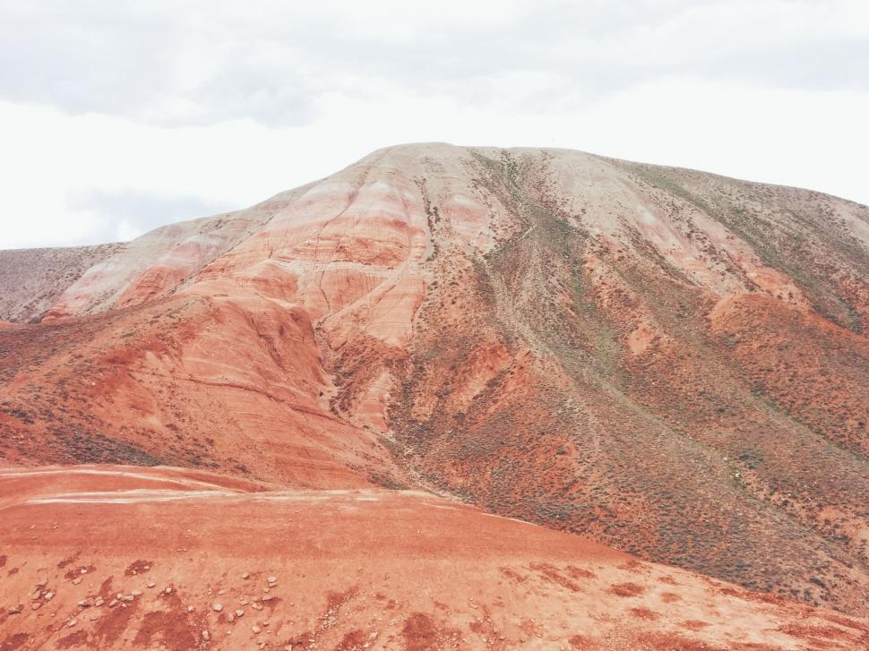 Free Image of Majestic Mountain Peak Towering Over Large Mountain 