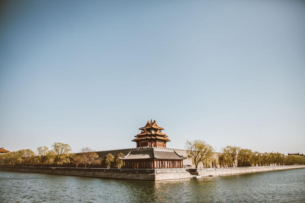 Free Image of Historic Building Next to River 