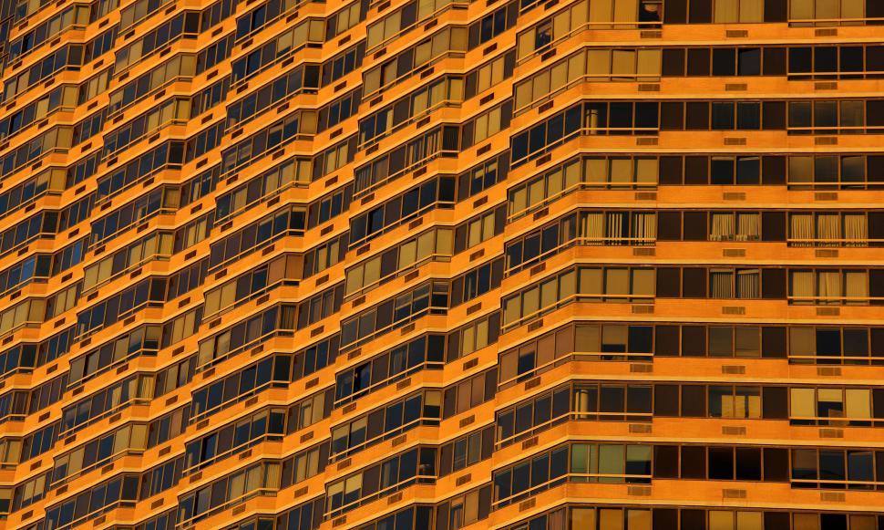 Free Image of Towering Skyscraper With Numerous Windows 