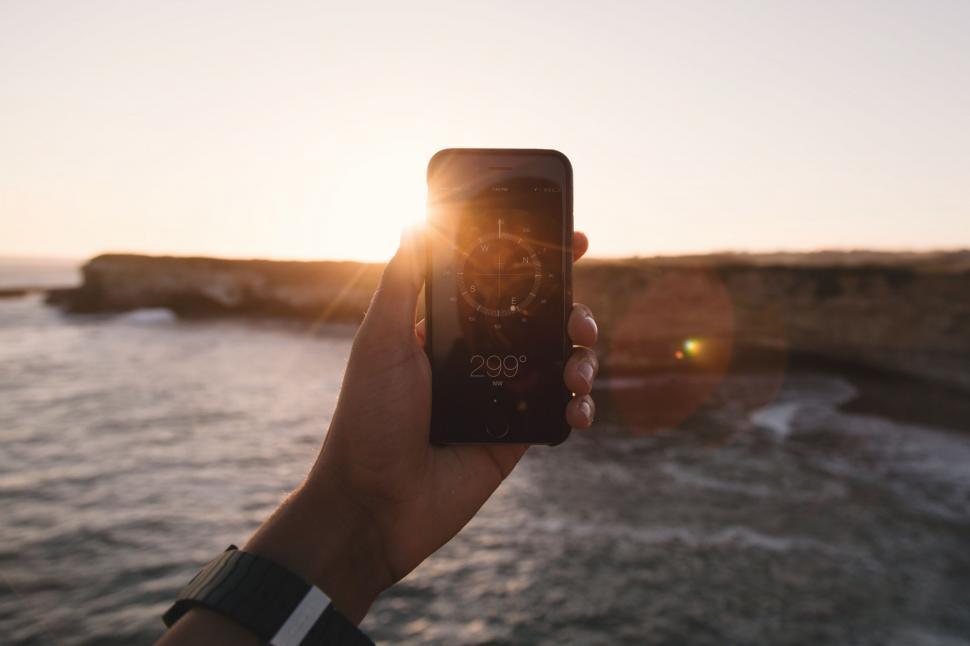 Free Image of Person Taking a Picture of the Ocean With a Cell Phone 