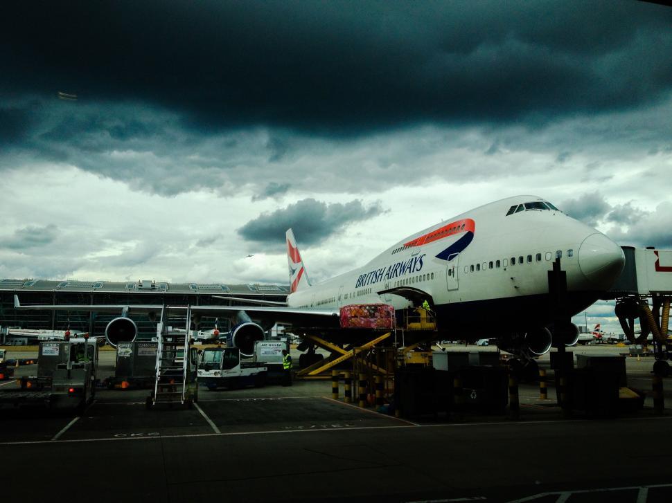 Free Image of Large Jetliner Parked on Airport Tarmac 