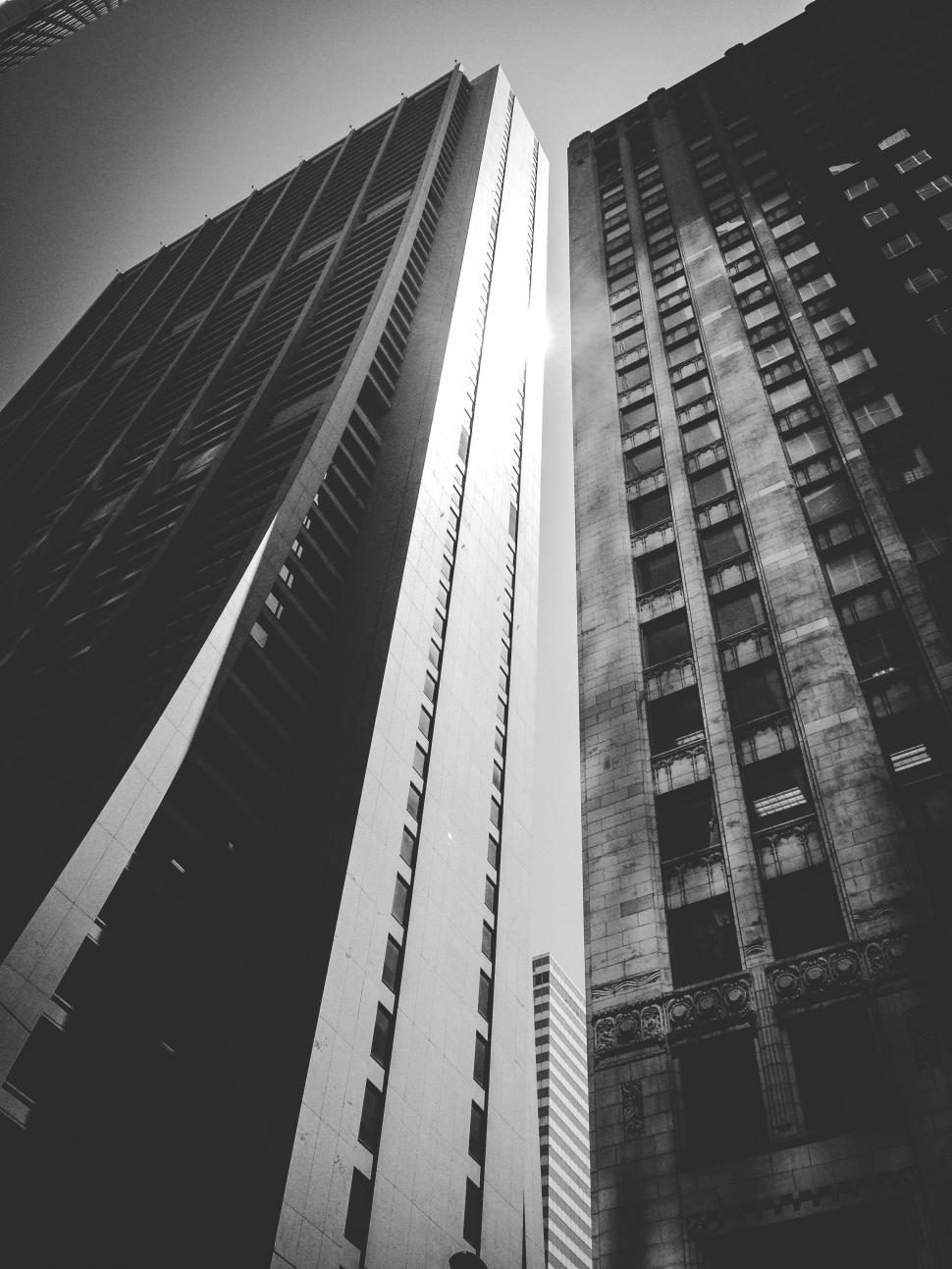 Free Image of Two Tall Buildings in Black and White 