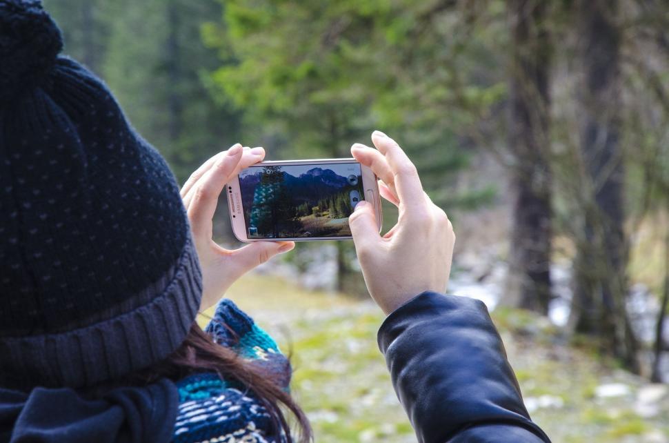 Free Image of Person Taking Picture With Cell Phone 