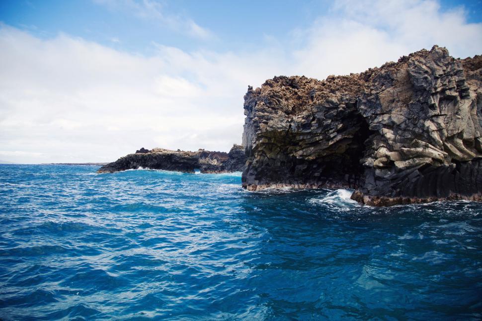 Free Image of Rock Outcropping in the Middle of the Ocean 