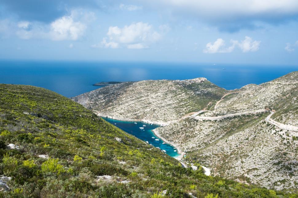 Free Image of Overlooking Body of Water From Hilltop 