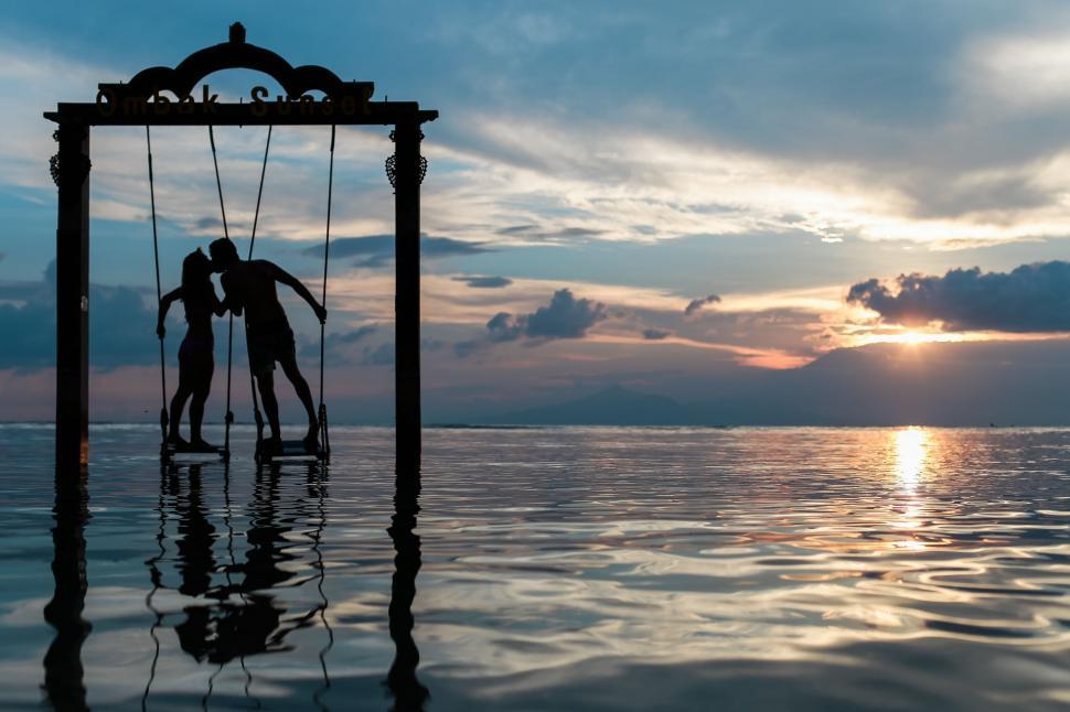 Free Image of People Standing in Water 