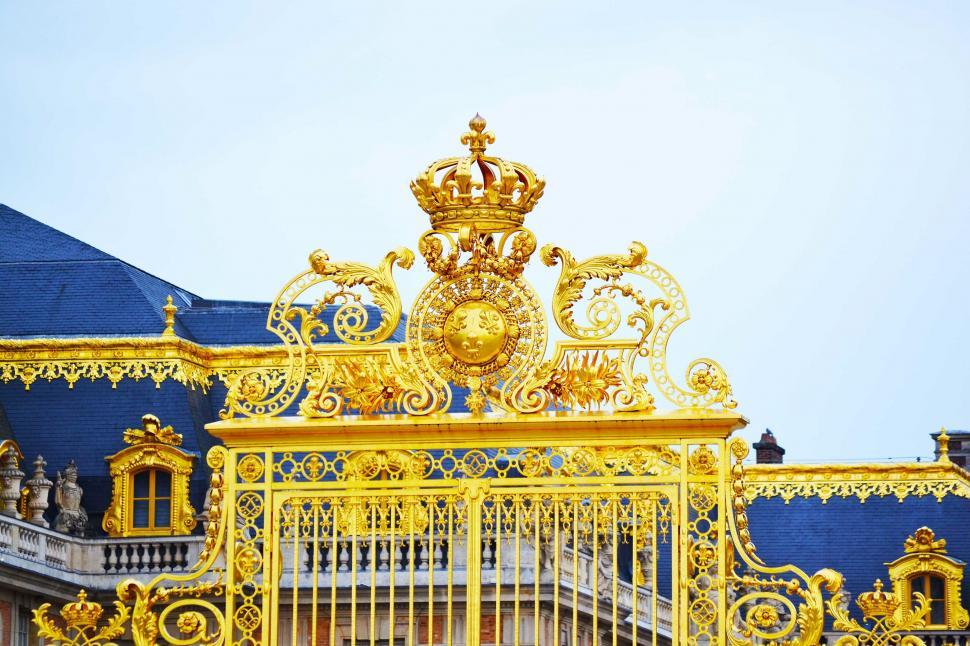 Free Image of Majestic Golden Gate With Crown Atop 