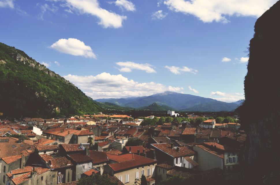 Free Image of Cityscape With Mountains in the Background 