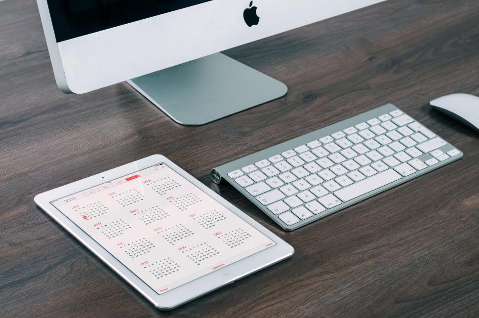 Free Image of Modern Desk Setup With Keyboard, Mouse, Tablet, and Monitor 